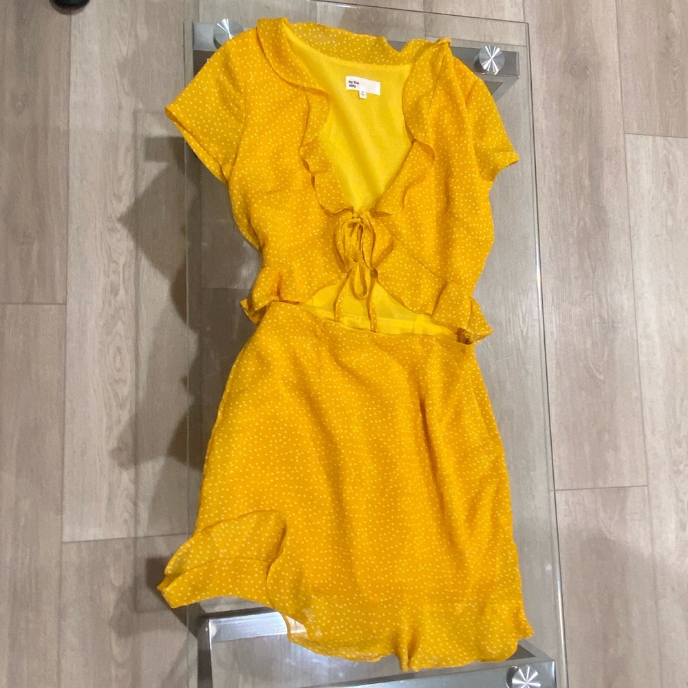 Yellow polka dot mini dress with cutout